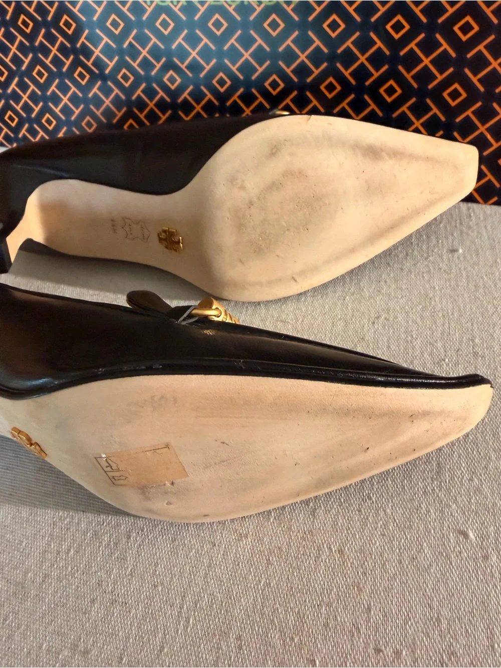 Tory Burch Black Leather Pointed Loafers with Gold Chain Accent